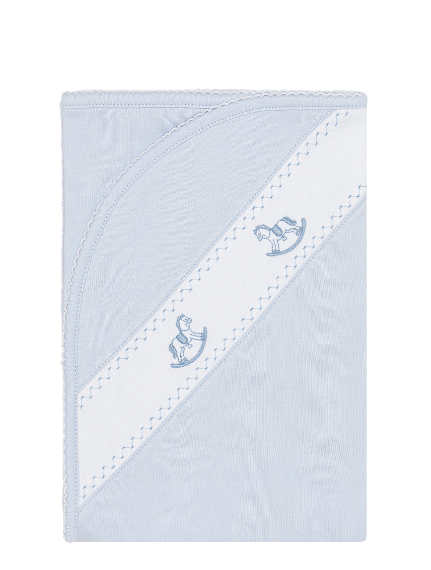 A light blue baby blanket with a diagonal white embroidered stripe and embroidered horse motifs, shown centered over a blurred Shopify product page background.