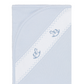 A light blue baby blanket with a diagonal white embroidered stripe and embroidered horse motifs, shown centered over a blurred Shopify product page background.